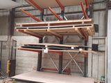 a lot of shelves that are stacked up in a warehouse