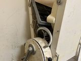 a machine that is sitting inside of a building