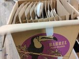 a carton with a bunch of paper plates in it