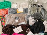 a pile of clothing that is sitting on a table