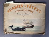 un vieux livre sur lequel figurent une baleine et un bateau