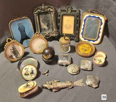 a lot of antique items that are on a table