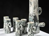 a group of cups that are sitting on a table