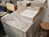 a pile of boxes sitting on top of a table in a room