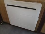 a picture of a wall mounted heater in a kitchen