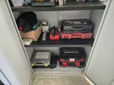 many tools and tools on the shelves in the room