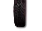 a close up of a tire on a white background