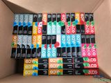 a lot of cigarettes in a cardboard box on the table