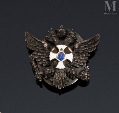 a close up of a badge on a black surface
