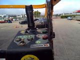 a machine that is sitting in the middle of a parking lot