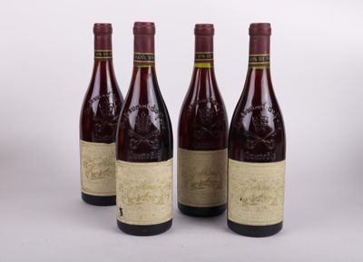 three bottles of wine sitting next to each other on a table