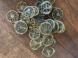 a lot of small pieces of metal sitting on a table