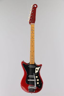 a red electric guitar on a stand against a white background