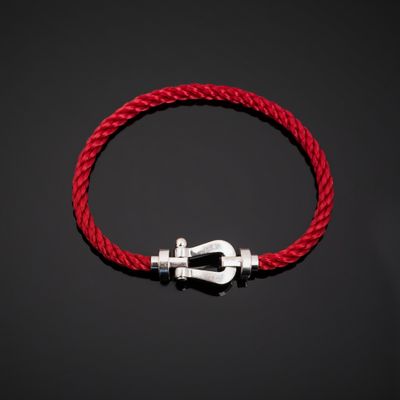 FRED « Force 10 ». Bracelet manille en or blanc 750°°° (tête…