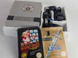 a box of nintendo games and a nintendo wii controller