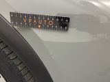 a close up of a sticker on the hood of a car