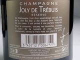 a label on a bottle of champagne on a table