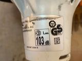 a close up of a light bulb with a sticker on it