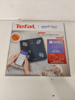 a box with a cell phone and a cell phone on it