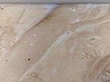 a picture of a close up view of a marble floor