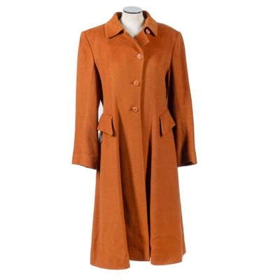 an orange coat on a mannequin mannequin mannequin mannequin mannequin mannequin mannequin mannequin mannequin
