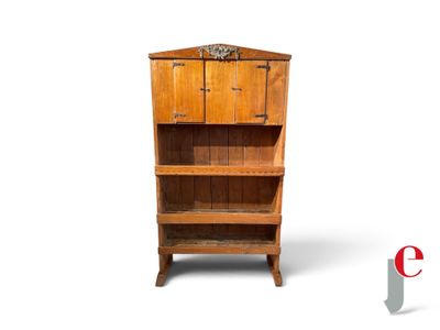a wooden shelf with a cabinet on top of it
