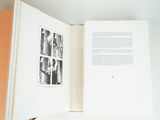 an open book with a picture of a man on it