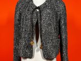 a black and white jacket on a mannequin mannequin mannequin mannequin mannequin mannequin mannequin mannequin mann