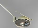 a light that is hanging from the ceiling in the room