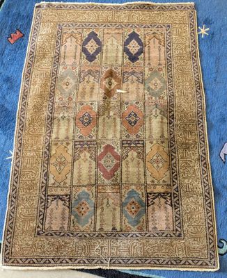 an image of a rug on a table with a clock on it