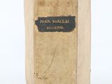 an old book that is sitting on a table
