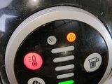 a close up of a control panel on a toaster