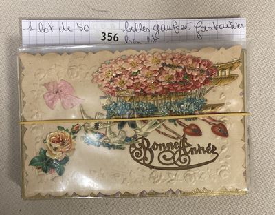 a card with a picture of a basket of flowers on it