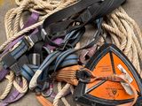 a pile of rope and other items on the ground