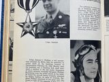 an open book with pictures of men in military uniforms