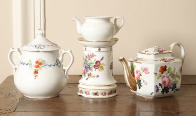 three different types of teapots sitting on a table