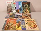 many books that are sitting on a table