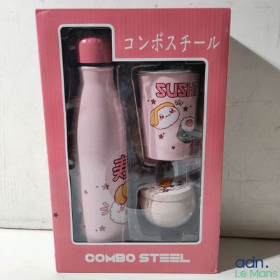 une boîte rose contenant un flacon et une brosse à dents