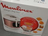 box of food sitting on a counter top with a box of crackers in front of it