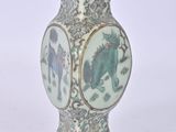 a vase with a picture of a horse on it