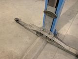 an image of a close up of a fork lift in a garage