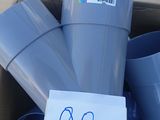 a cardboard box full of plastic rain boots and a sign that says 90