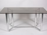 an image of a glass table with chrome legs