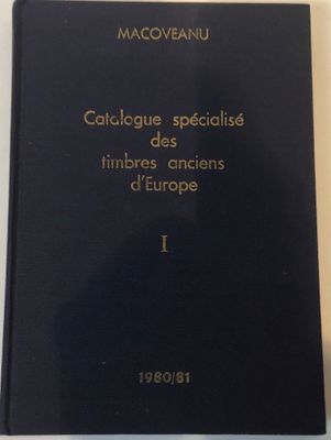 a black book sitting on top of a white table