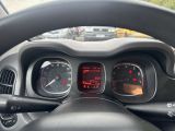 a close up of a car dashboard with a steering wheel