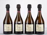trois bouteilles de vin posées l'une à côté de l'autre sur une table