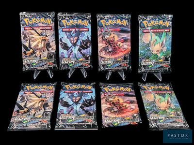 un lot de six paquets de cartes à collectionner Pokémon sur fond noir