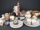 a lot of antique and modern items on the table