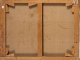 an old picture frame with a piece of cardboard on top of it