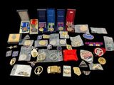 an image of a collection of medals and other items on a table